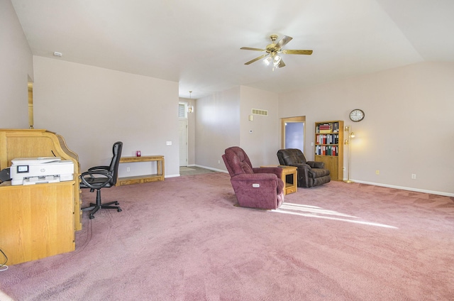 office space featuring carpet floors, ceiling fan, and vaulted ceiling