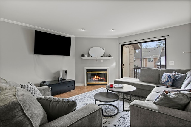 living room featuring crown molding and hardwood / wood-style flooring