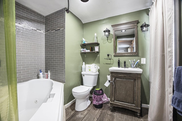 full bathroom with vanity, toilet, hardwood / wood-style floors, and shower / bath combo