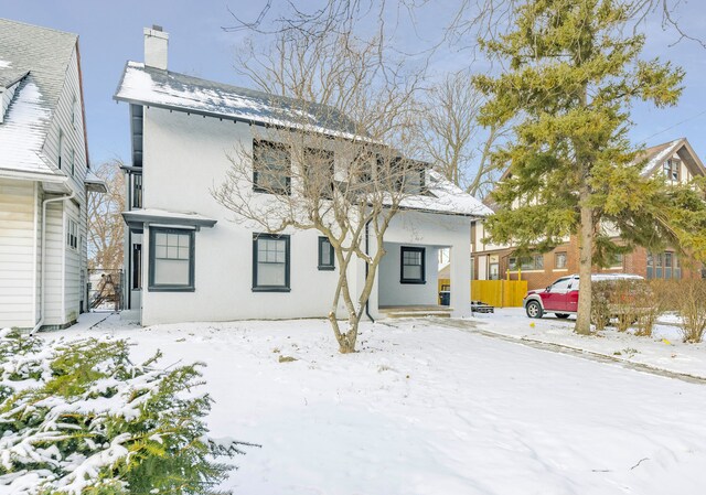 view of snow covered property