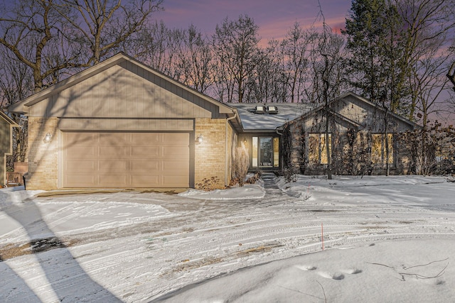 single story home with a garage