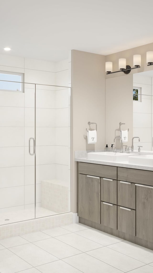 bathroom featuring vanity, tile patterned floors, and walk in shower