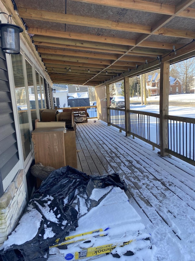 view of snow covered deck