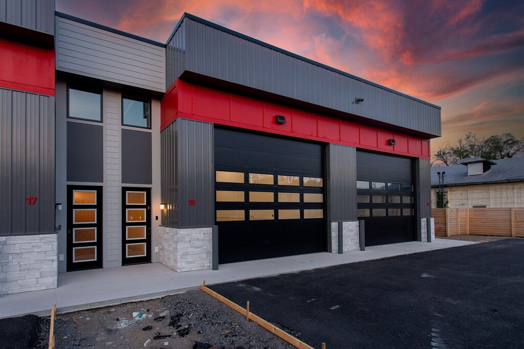 view of outdoor building at dusk