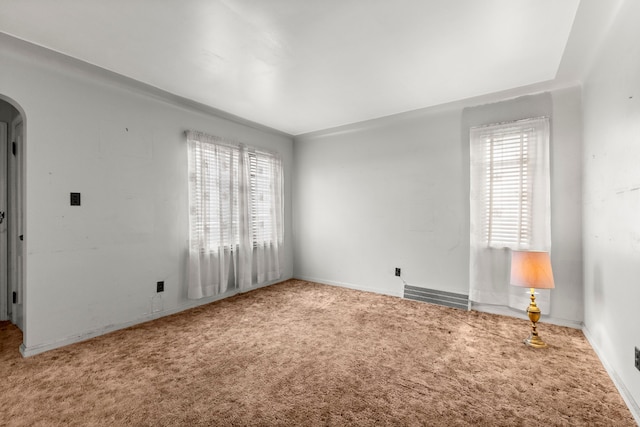 spare room featuring carpet floors