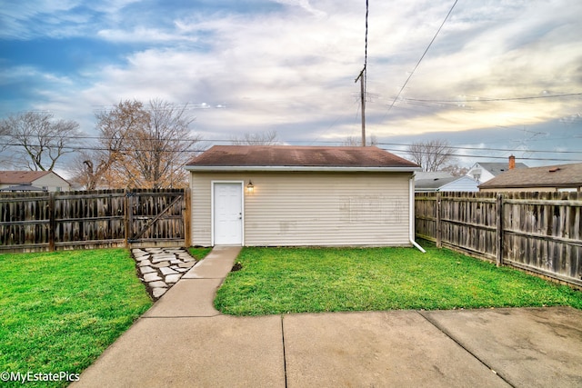 view of outdoor structure with a lawn