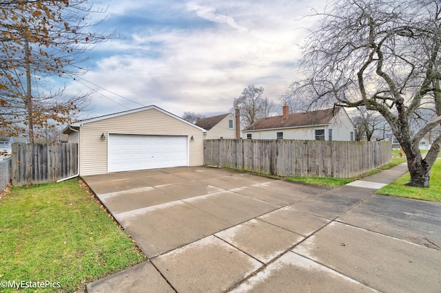 garage featuring a yard