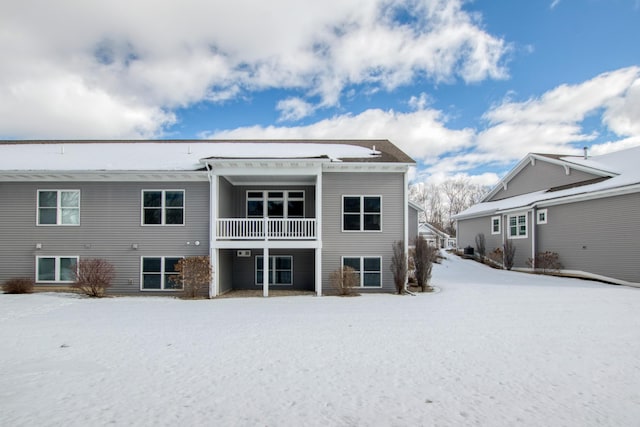 view of snow covered property