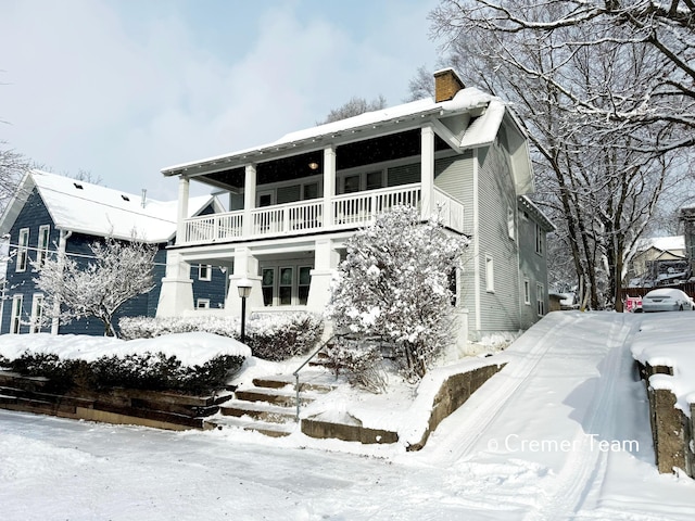 view of front of home with a balcony