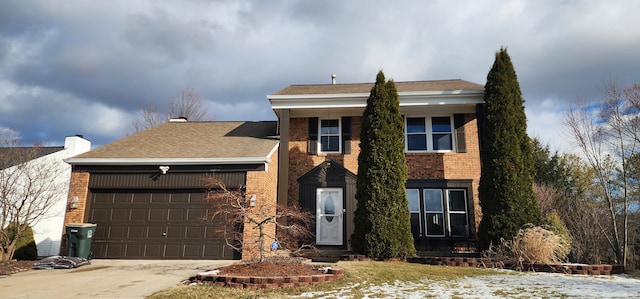 view of front of home with a garage