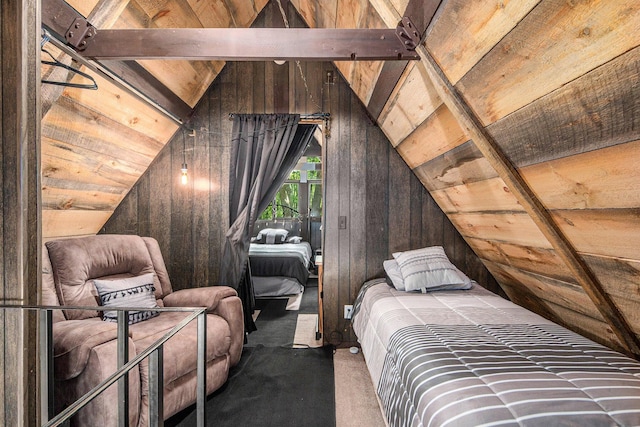 bedroom featuring wood ceiling, carpet, and wood walls