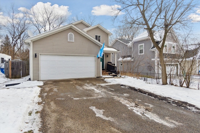 view of front of property featuring a garage