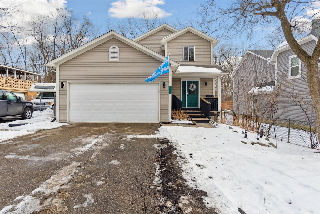 front of property with a garage