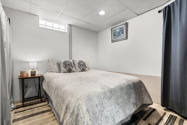 bedroom with a paneled ceiling