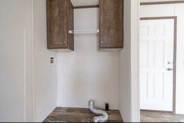 laundry room with cabinets and washer hookup