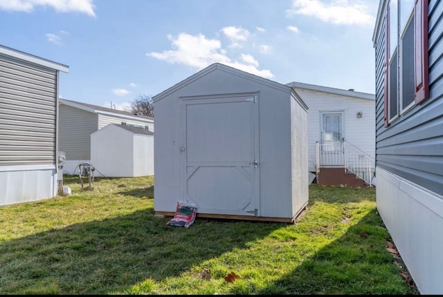 view of outdoor structure with a yard