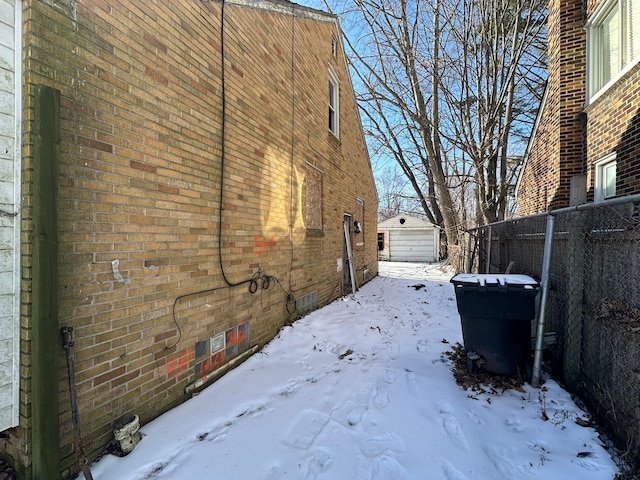 view of snow covered property