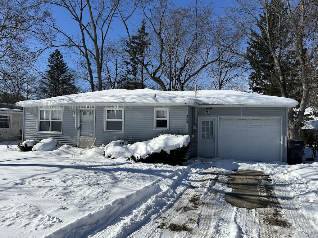 view of front of home featuring a garage