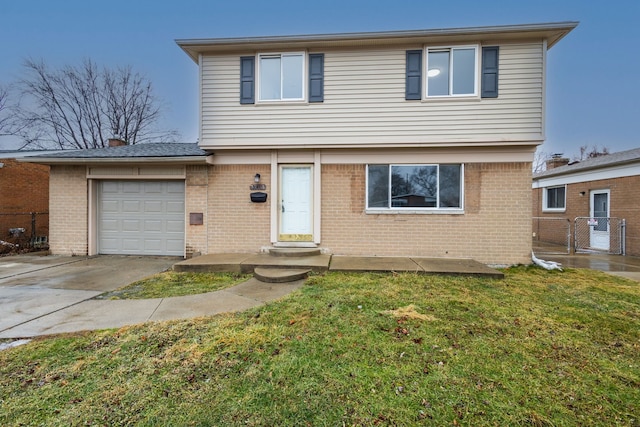 front of property with a garage and a front yard