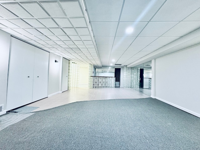 basement featuring carpet flooring