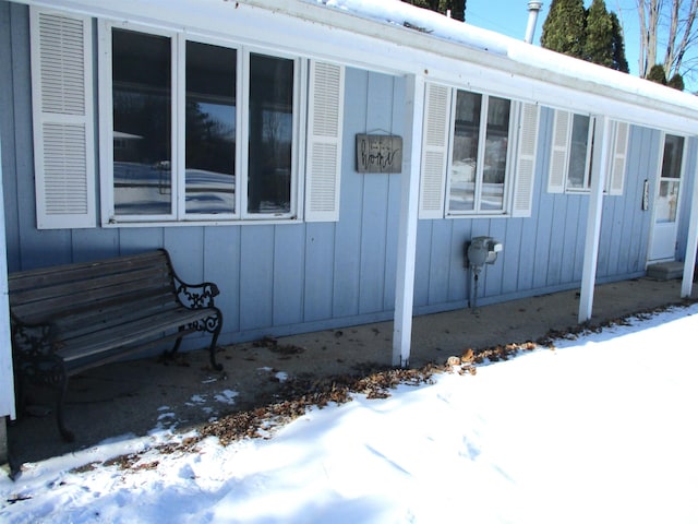 view of snow covered property