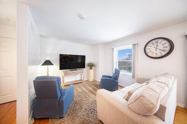 living room with light hardwood / wood-style flooring