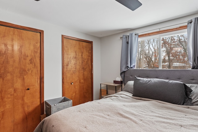 bedroom featuring two closets