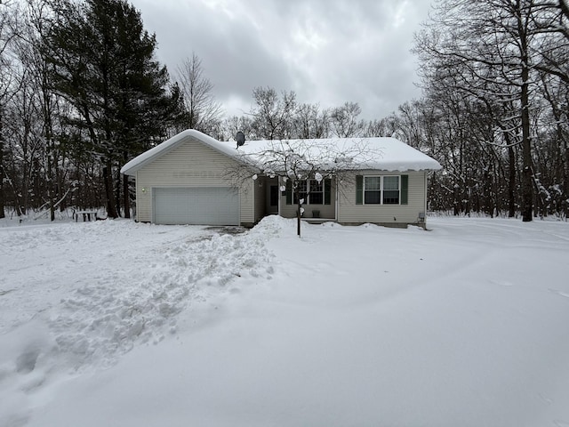 single story home featuring a garage