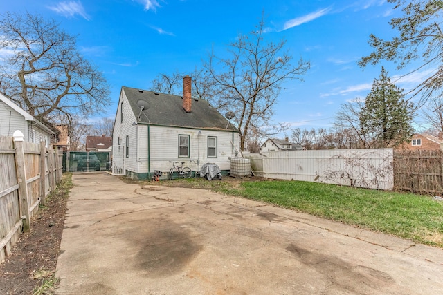 rear view of house with a patio