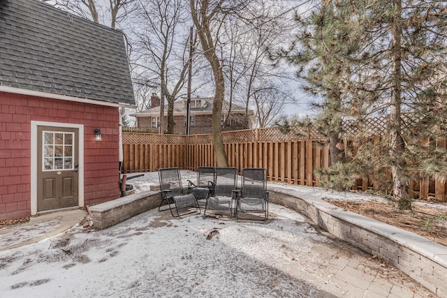 view of snow covered patio