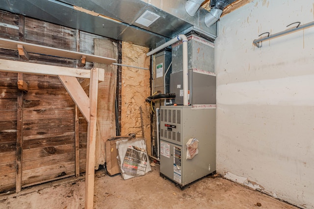 utility room with heating unit