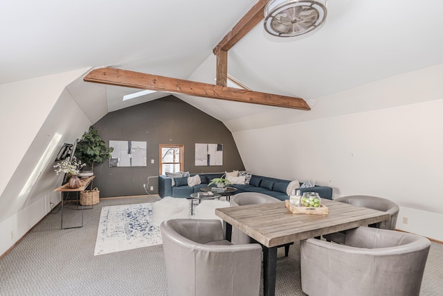 dining space featuring vaulted ceiling with beams and carpet flooring