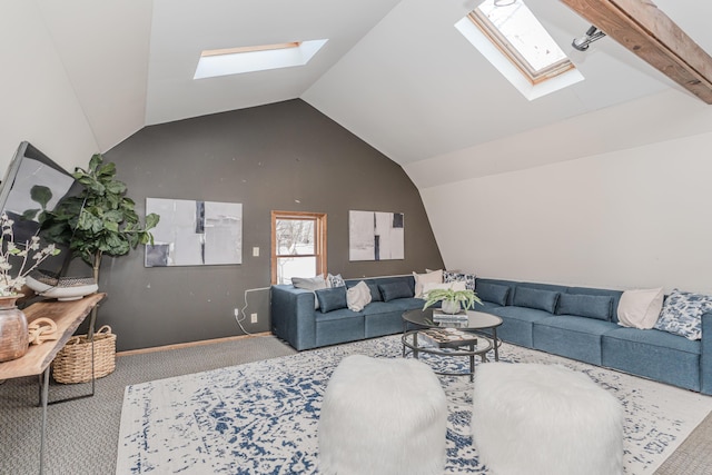 carpeted living room featuring vaulted ceiling with skylight