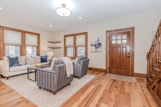 living room with light hardwood / wood-style floors