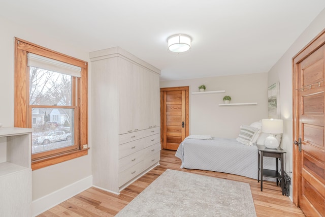 bedroom featuring light hardwood / wood-style floors