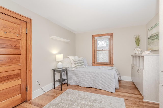 bedroom with light wood-type flooring