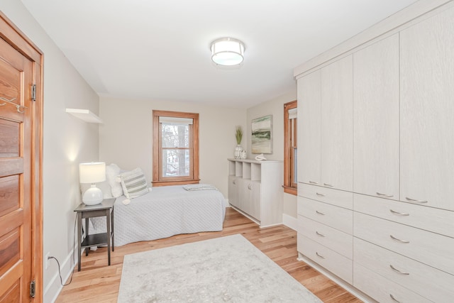 bedroom featuring light wood-type flooring