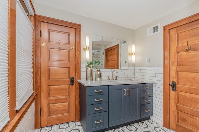 bathroom featuring vanity and tile patterned floors