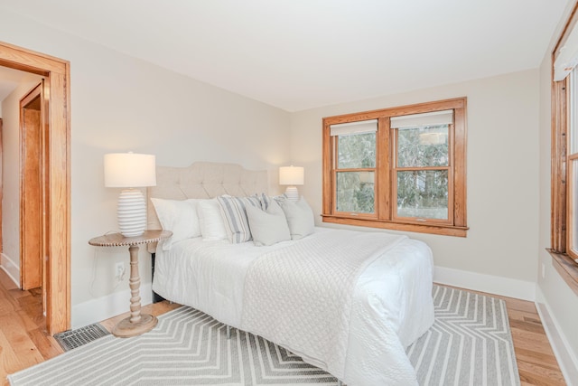 bedroom featuring light wood-type flooring