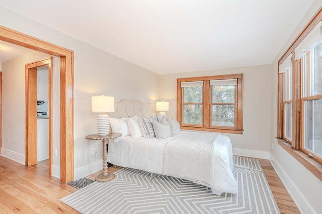 bedroom with light wood-type flooring