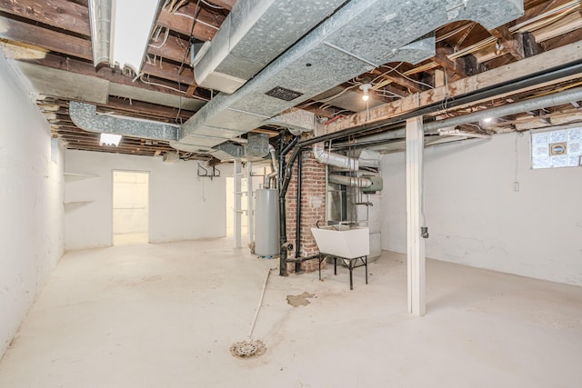 basement with sink and gas water heater