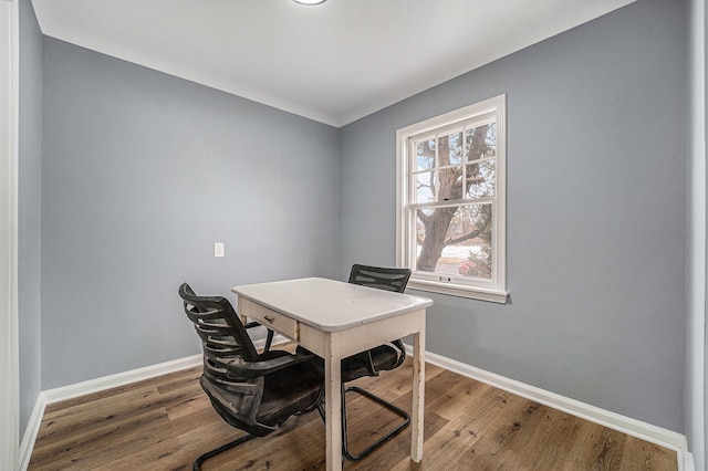 office space with hardwood / wood-style floors