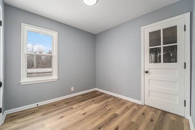 empty room featuring light hardwood / wood-style floors