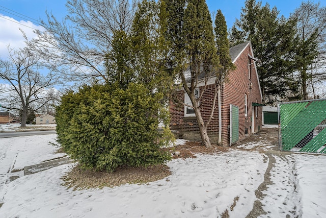 view of snow covered property