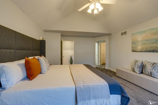 bedroom featuring vaulted ceiling, ceiling fan, and carpet flooring