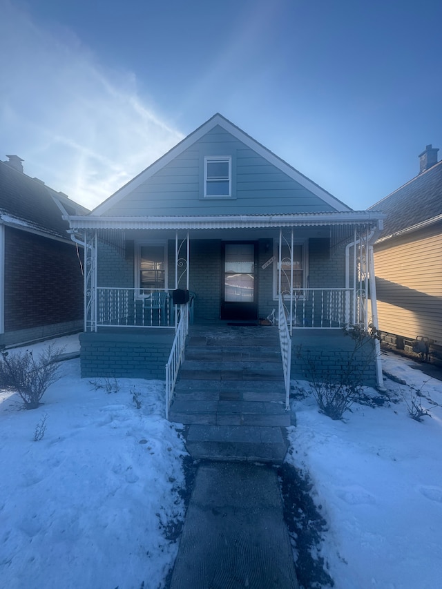 bungalow-style house featuring covered porch