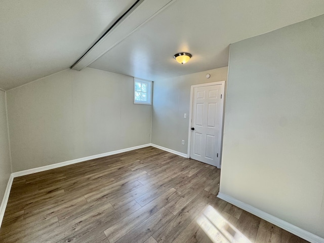 bonus room featuring light wood-type flooring