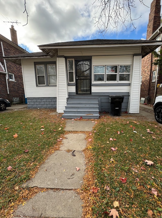 view of front of home with a front yard