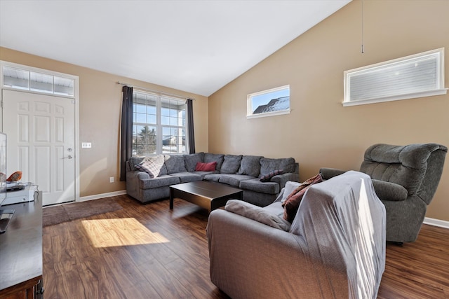 living room with lofted ceiling and dark hardwood / wood-style flooring