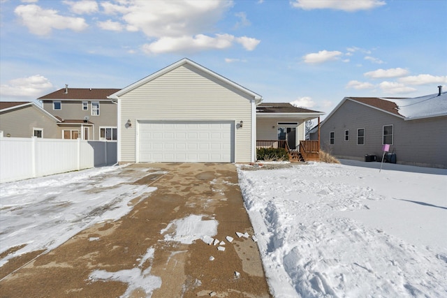 view of front facade featuring a garage and a porch